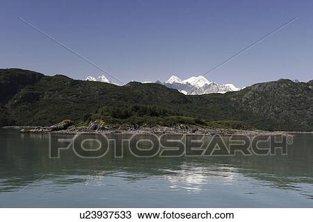 The Fairweather range reflected in the calm waters of the inside passage, Southeast Alaska, USA. View Large Photo Image Stock Image - The Fairweather range reflected in the calm waters of the inside passage, Southeast Alaska, USA.. Fotosearch