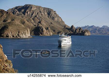Picture - The Lindblad expedition vessel m/v Sea Lion in Honeymoon Bay on Danzante Island in the Gulf of California (Sea of Cortez), Baja California, Mexico.. Fotosearch