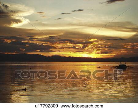 The wonderful colours of the sunset, Cabilao Island. Philippines. (2007) View Large Photo Image Stock Photo - The wonderful colours of the sunset, Cabilao Island. Philippines. (2007). Fotosearch