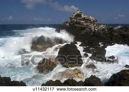 Wave crashing over rocks, St. Peter and St. Paul's rocks, Brazil, Atlantic Ocean View Large Photo Image Stock Photo - Wave crashing over rocks, St. Peter and St. Paul's rocks, Brazil, Atlantic Ocean . Fotosearch