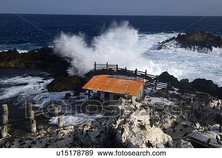 Waves pounding at rocks near field research station, St. Peter and St. Paul's rocks, Brazil, Atlantic Ocean View Large Photo Image Stock Photo - Waves pounding at rocks near field research station, St. Peter and St. Paul's rocks, Brazil, Atlantic Ocean . Fotosearch