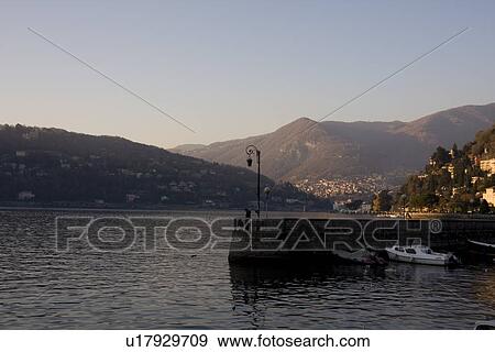 Stock Photo - A romantic couple. Lake Como, Italy.. Fotosearch