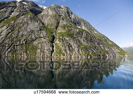 Stock Photo - A view of Nordfjord, an arm of the larger Melfjord - situated just above the Arctic Circle - in northern Norway, Barents Sea.. Fotosearch