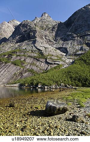 A view of Nordfjord, an arm of the larger Melfjord - situated just above the Arctic Circle - in northern Norway, Barents Sea. View Large Photo Image Stock Photo - A view of Nordfjord, an arm of the larger Melfjord - situated just above the Arctic Circle - in northern Norway, Barents Sea.. Fotosearch