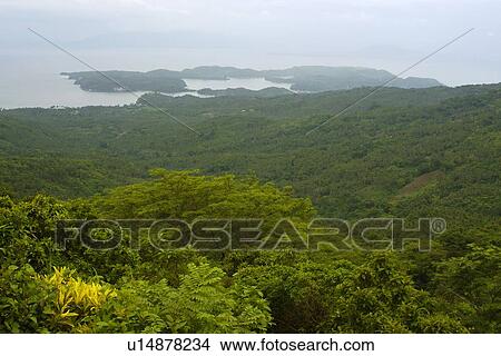 Picture - Aerial view of the natural narbour of Puerto Galera, Mindoro, Philippines. Fotosearch