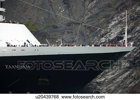 Stock Photo - Alaskan scenery in and around Southeast Alaska, USA. The cruise ship Zaandam inside Johns Hopkins Glacier in Glacier Bay National Park.. Fotosearch
