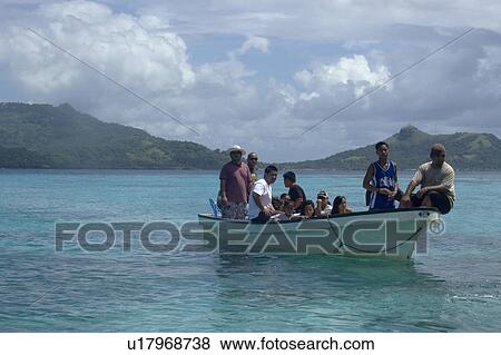 Boat with local family approaches island for a day trip, Truk lagoon, Chuuk, Federated States of Micronesia, Pacific View Large Photo Image Stock Photo - Boat with local family approaches island for a day trip, Truk lagoon, Chuuk, Federated States of Micronesia, Pacific. Fotosearch