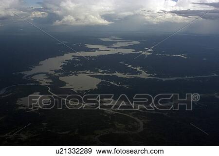 Flooded tropical rain forest, aerial view, Amazonas, Brazil View Large Photo Image Stock Photo - Flooded tropical rain forest, aerial view, Amazonas, Brazil. Fotosearch