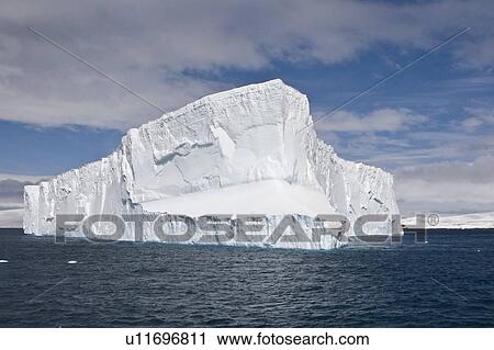 Stock Image - Iceberg detail in and around the Antarctic Peninsula during the summer months. More icebergs are being created as global warming is causing the breakup of major ice shelves and glaciers.. Fotosearch