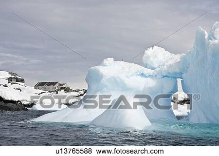 Iceberg detail in and around the abandoned British research base "W" in Crystal Sound near the Antarctic Peninsula during the summer months. More icebergs are being created as global warming is causing the breakup of major ice shelves and glaciers. View Large Photo Image Stock Photo - Iceberg detail in and around the abandoned British research base "W" in Crystal Sound near the Antarctic Peninsula during the summer months. More icebergs are being created as global warming is causing the breakup of major ice shelves and glaciers.. Fotosearch