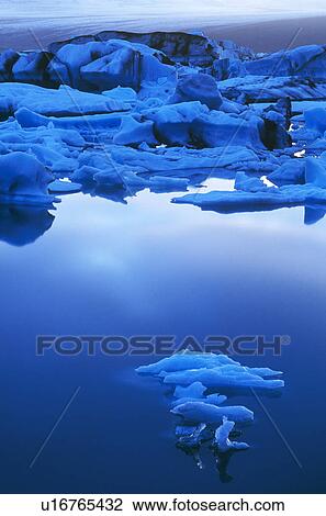 Stock Image - Jokulsarlon glacial lagoon in the evening light. Iceland. Fotosearch