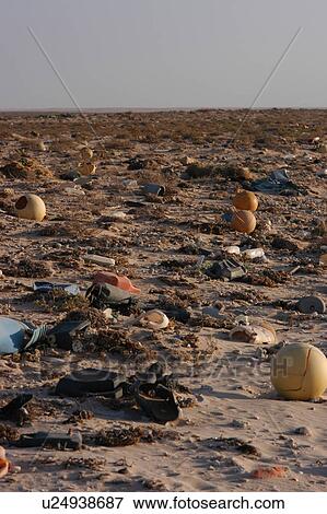 Stock Photo - Litter washed up on the beach, Southern Morocco. Fotosearch