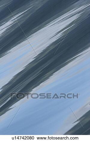 Stock Image - Patterns in the ocean created by the ship's wake in Behm Canal, Southeast Alaska, USA. Pacific Ocean.. Fotosearch