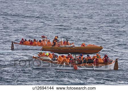 Picture - Rescue operation for sinking ship MV Explorer in Antarctica.. Fotosearch
