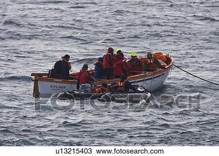 Rescue operation for sinking ship MV Explorer in Antarctica. View Large Photo Image Stock Image - Rescue operation for sinking ship MV Explorer in Antarctica.. Fotosearch