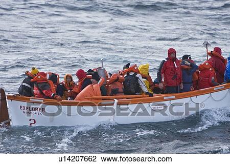 Stock Image - Rescue operation for sinking ship MV Explorer in Antarctica.. Fotosearch