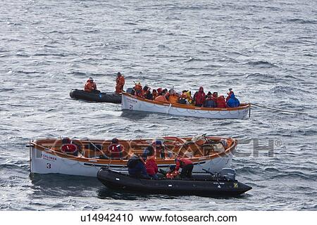 Stock Image - Rescue operation for sinking ship MV Explorer in Antarctica.. Fotosearch