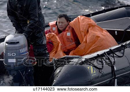 Stock Image - Rescue operation for sinking ship MV Explorer in Antarctica.. Fotosearch