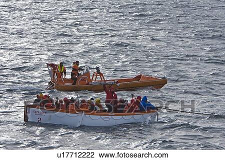 Stock Image - Rescue operation for sinking ship MV Explorer in Antarctica.. Fotosearch