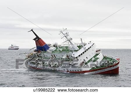 Rescue operation for sinking ship MV Explorer in Antarctica. View Large Photo Image Stock Image - Rescue operation for sinking ship MV Explorer in Antarctica.. Fotosearch