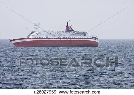 Stock Photo - Rescue operation for sinking ship MV Explorer in Antarctica.. Fotosearch