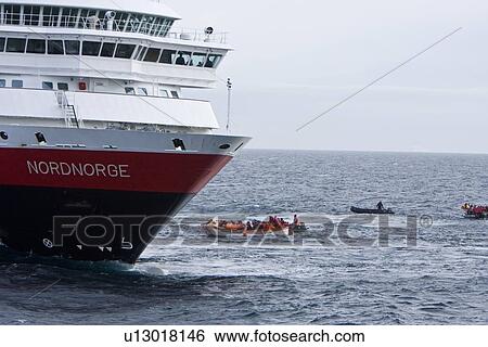 Rescue operation for sinking ship MV Explorer in Antarctica. View Large Photo Image Stock Photograph - Rescue operation for sinking ship MV Explorer in Antarctica.. Fotosearch