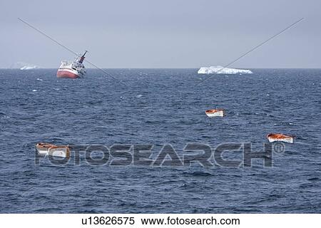 Stock Photography - Rescue operation for sinking ship MV Explorer in Antarctica.. Fotosearch