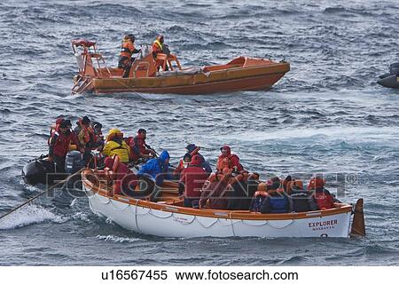 Stock Photography - Rescue operation for sinking ship MV Explore in Antarctica.. Fotosearch
