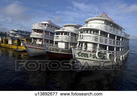 River boats lined up at the main port, Manaus, Amazonas, Brazil View Large Photo Image Stock Photo - River boats lined up at the main port, Manaus, Amazonas, Brazil. Fotosearch