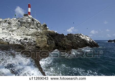 Seawater flowing and lighthouse, St. Peter and St. Paul's rocks, Brazil, Atlantic Ocean View Large Photo Image Stock Image - Seawater flowing and lighthouse, St. Peter and St. Paul's rocks, Brazil, Atlantic Ocean . Fotosearch