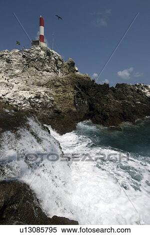 Seawater flowing and lighthouse, St. Peter and St. Paul's rocks, Brazil, Atlantic Ocean View Large Photo Image Stock Photography - Seawater flowing and lighthouse, St. Peter and St. Paul's rocks, Brazil, Atlantic Ocean . Fotosearch
