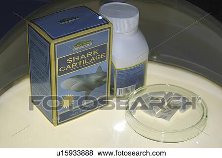 Stock Photo - Shark cartilage pills on display; once believed to prevent cancer, this product has no demonstraed health benefit; Busan aquarium, Busan, South Korea. Fotosearch