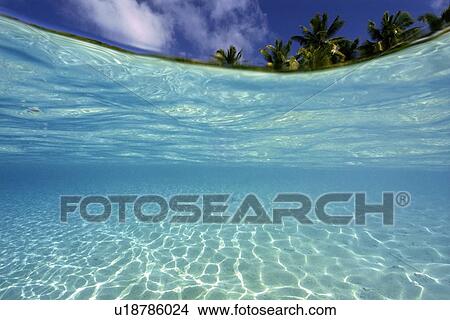 Split image of sand bottom and island, Rongelap, Marshall Islands, Micronesia View Large Photo Image Picture - Split image of sand bottom and island, Rongelap, Marshall Islands, Micronesia. Fotosearch