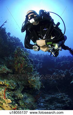Stock Photo - Technical Divers using Trimix, Rebreathers and technical diving equipment, Divetech, Grand Cayman, Cayman Islands, Caribbean. Fotosearch