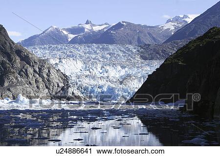 Stock Image - The Sawyer Glacier, a tidewater glacier at the end of Tracy Arm in Southeast Alaska, USA.. Fotosearch