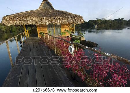 Stock Image -  Uakari floating lodge ecoresort, Mamiraua sustainable development reserve, Amazonas, Brazil. Fotosearch