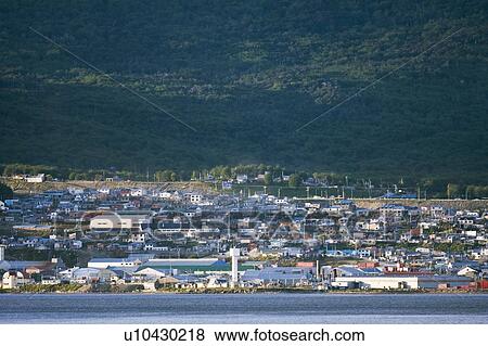 Stock Photo - View of the town of Ushuaia, Argentina on the island of Tierra del Fuego. This city bills itself as the southernmost city in the world.. Fotosearch