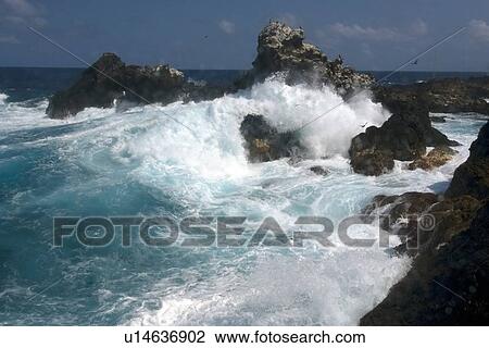 Wave crashing over rocks St. Peter and St. Paul's rocks, Brazil, Atlantic Ocean View Large Photo Image Stock Image - Wave crashing over rocks St. Peter and St. Paul's rocks, Brazil, Atlantic Ocean . Fotosearch