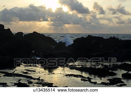 Waves breaking near tide pool at dawn, St. Peter and St. Paul's rocks, Brazil, Atlantic Ocean View Large Photo Image Picture - Waves breaking near tide pool at dawn, St. Peter and St. Paul's rocks, Brazil, Atlantic Ocean . Fotosearch