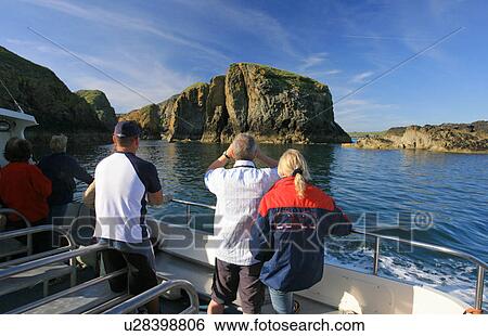 Stock Photograph - Wildlife adventure boat trip. Ramsey Island, Pembrokeshire, Wales, UK. Fotosearch