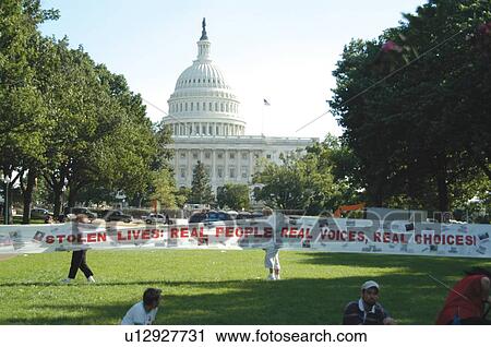 Crowd of people with disabilities in front of the Nation's Capitol holding banner during the ADAPT March on Washington to advocate for the civil rights of people with disabilities. View Large Photo Image Stock Image - Crowd of people with disabilities in front of the Nation's Capitol holding banner during the ADAPT March on Washington to advocate for the civil rights of people with disabilities.. Fotosearch