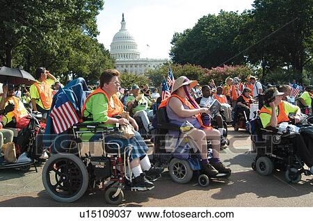 Crowd of people with disabilities gathered at the nation's capitol as a part of the ADAPT March on Washington to advocate for the civil rights of people with disabilities. View Large Photo Image Stock Photo - Crowd of people with disabilities gathered at the nation's capitol as a part of the ADAPT March on Washington to advocate for the civil rights of people with disabilities.. Fotosearch