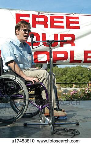 Man with a disability participating in the ADAPT March on Washington to advocate for the civil rights for people with disabilities. View Large Photo Image Stock Image - Man with a disability participating in the ADAPT March on Washington to advocate for the civil rights for people with disabilities.. Fotosearch