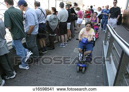 Mother and son with disabilities sightseeing while on vacation. View Large Photo Image Stock Image - Mother and son with disabilities sightseeing while on vacation.. Fotosearch