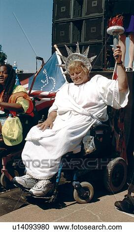 Woman with a disability who utilizes a wheelchair for mobility dressed as the Statue of Liberty at a national disability civil rights event. View Large Photo Image Stock Image - Woman with a disability who utilizes a wheelchair for mobility dressed as the Statue of Liberty at a national disability civil rights event.. Fotosearch