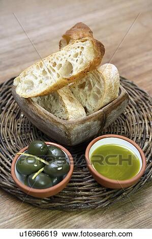Bread with Amalfi olives and olive oil View Large Photo Image Stock Photo - Bread with Amalfi olives and olive oil. Fotosearch