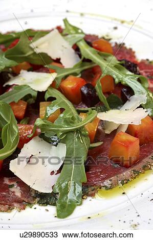 Carpaccio with beetroot, rocket and horseradish View Large Photo Image Stock Image - Carpaccio with beetroot, rocket and horseradish. Fotosearch