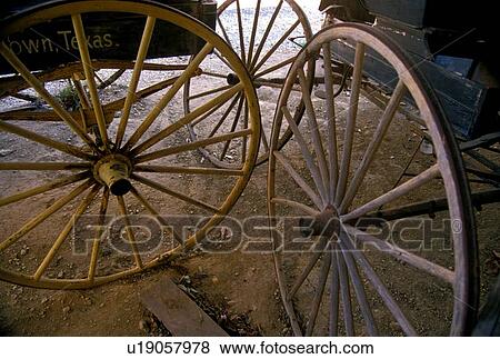 Stock Photo - close up of old west wagon wheels. Fotosearch