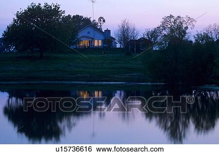 farm house on a pond at dusk View Large Photo Image Stock Photograph - farm house on a pond at dusk. Fotosearch