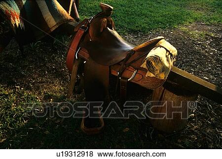 horse saddle sitting out View Large Photo Image Stock Photo - horse saddle sitting out. Fotosearch